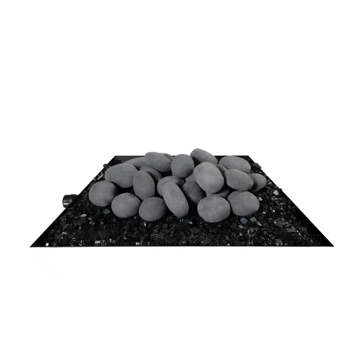 Side-view silo image of the Starfire Designs Fire Pebbles, 24-piece set in light gray. The light gray ceramic stones are heat-resistant and perfect for enhancing fire pits and fireplaces. Their smooth texture and contemporary color provide a stylish and clean look to any fire feature, making them an ideal decorative solution for outdoor spaces.