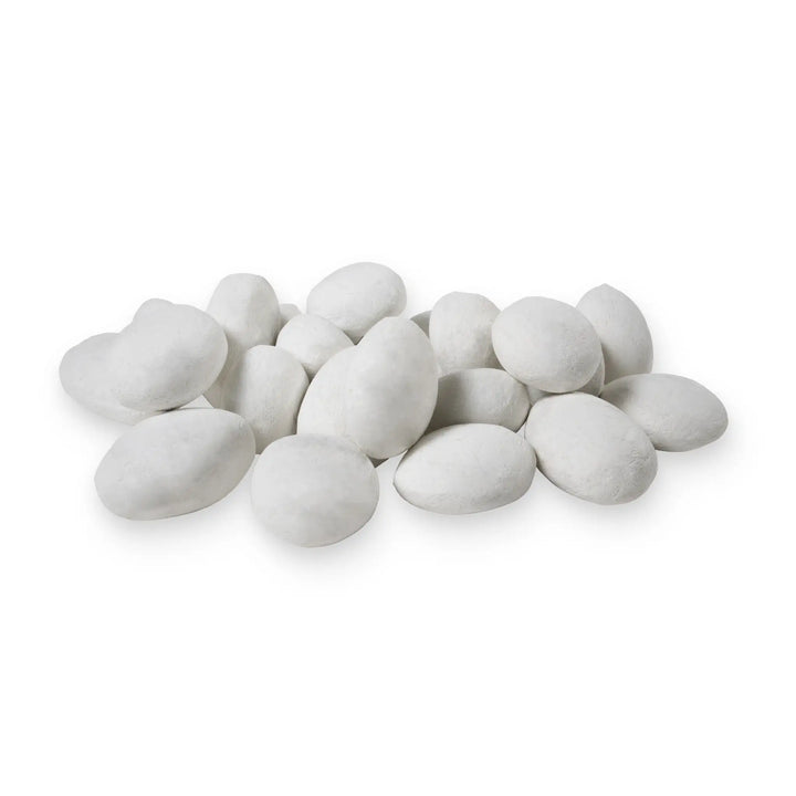 Starfire Designs white fire pebbles arranged in a pile, viewed from an angled perspective to highlight their smooth round shapes and polished surface. These 24-piece ceramic fire pebbles are perfect for decorating gas fire pits and provide a clean, elegant look. Heat-resistant and durable, they offer a luxurious aesthetic to modern outdoor settings. 