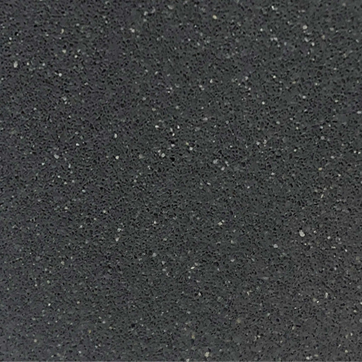 Graphite texture swatch for Starfire Designs Gravity 36-inch round concrete gas fire pit, highlighting the sleek and modern finish. This dark gray tone offers a contemporary look while providing robust weather resistance for both residential and commercial patios. Graphite fire pit, modern design, weather-resistant