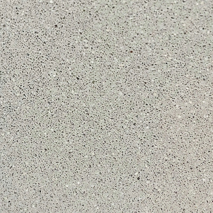 Natural gray texture swatch for Starfire Designs Gravity 36-inch round concrete gas fire pit, illustrating the versatile and neutral tone of the concrete. The natural gray color pairs well with any outdoor decor, providing a timeless, durable surface for fire pits. Natural gray fire pit, outdoor concrete finish, timeless design