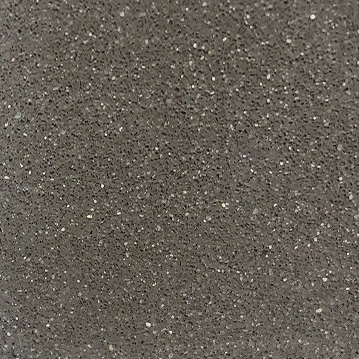 Close-up swatch of the brown finish on the Starfire Designs Gravity 45-inch square concrete gas fire pit, showcasing a smooth, high-durability surface with a rich earthy tone. The brown concrete texture is designed to blend seamlessly into outdoor environments, providing a warm and inviting look to your patio or garden