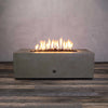 Front view of the Starfire Designs Gravity 60-inch by 24-inch Linear Concrete Gas Fire Pit in brown, featuring a sleek, rectangular design with vibrant flames atop a smooth brown concrete surface, ideal for enhancing outdoor living spaces