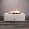 Front view of Starfire Designs Gravity 60-inch by 24-inch linear concrete gas fire pit in white, featuring modern design with natural gas fire pit capabilities, ideal for luxury outdoor fire pit settings and large backyard fire pit areas