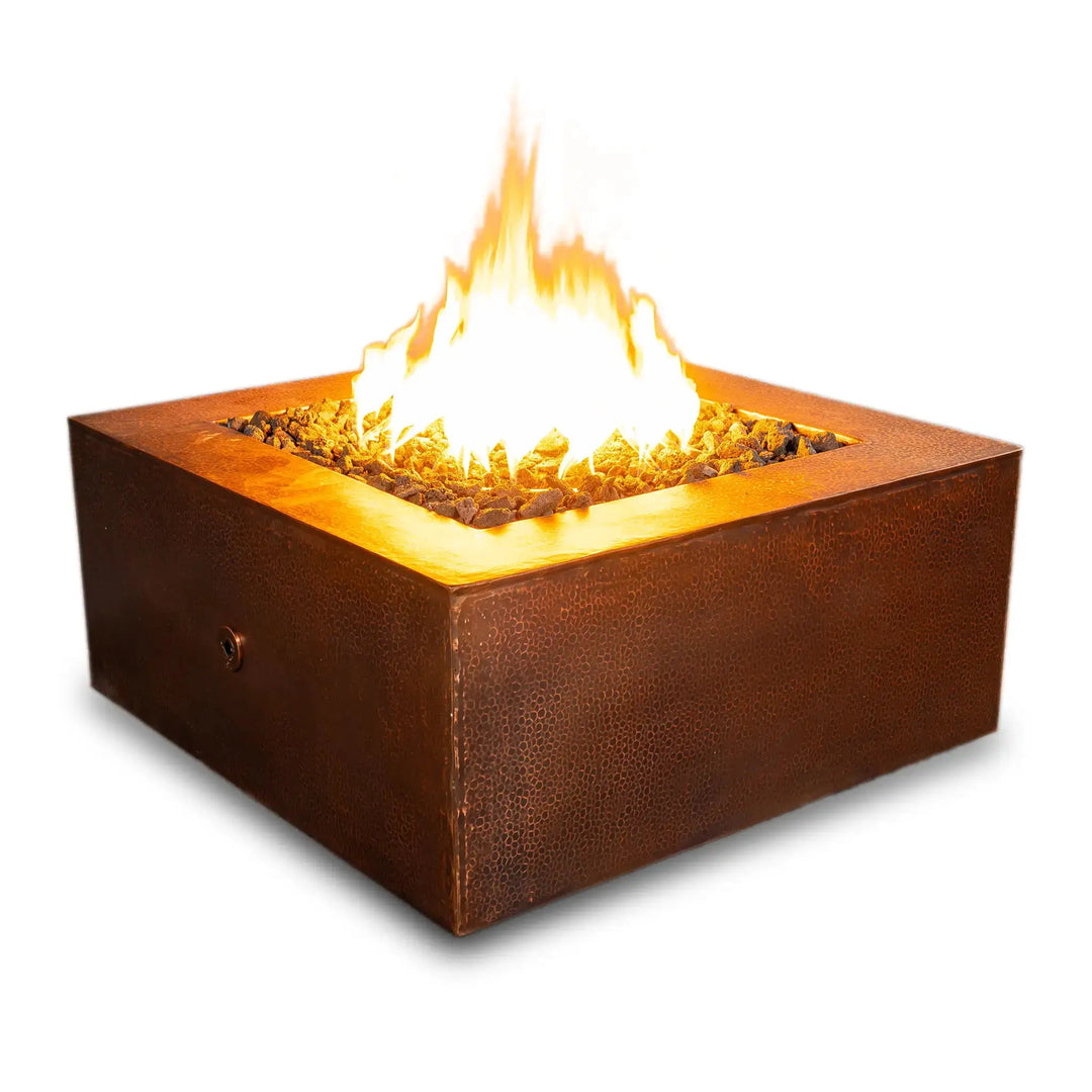 Starfire Designs Moreno square copper fire pit on a white background with flames blazing, featuring a hammered copper finish and clean, modern design for outdoor settings