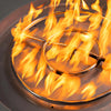 Close-up of the flame ring in the Starfire Designs Rustic 36-inch Round Concrete Gravity Gas Fire Pit in Natural Gray, showcasing the bright flames