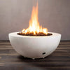 Starfire Designs Rustic 36-inch Round Concrete Gravity Gas Fire Pit in white color with bright flames lit, creating a warm and inviting atmosphere on a wooden deck