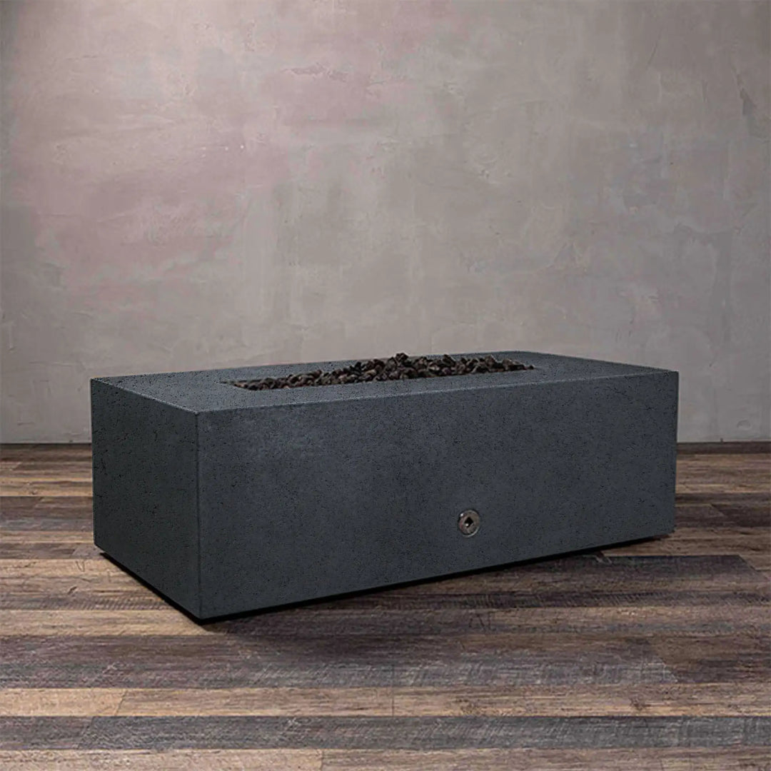 Side view of Starfire Designs Rustic 45-inch round concrete gravity gas fire pit in graphite color, unlit, highlighting the elegant design for modern outdoor settings