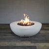 Full view of the Starfire Designs Rustic 45-inch Round Concrete Gravity Gas Fire Pit in white with the fire lit, illustrating the stylish design and functionality of this luxury outdoor fire pit