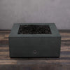 Back view of the Starfire Designs Rustic Gravity 36-inch Square Concrete Gas Fire Pit in graphite, displaying the fire pit's minimalistic and robust structure