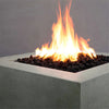 Closeup of the flame on the Starfire Designs Rustic Gravity 36-inch Square Concrete Gas Fire Pit in Natural Gray, highlighting the vibrant fire and modern concrete finish