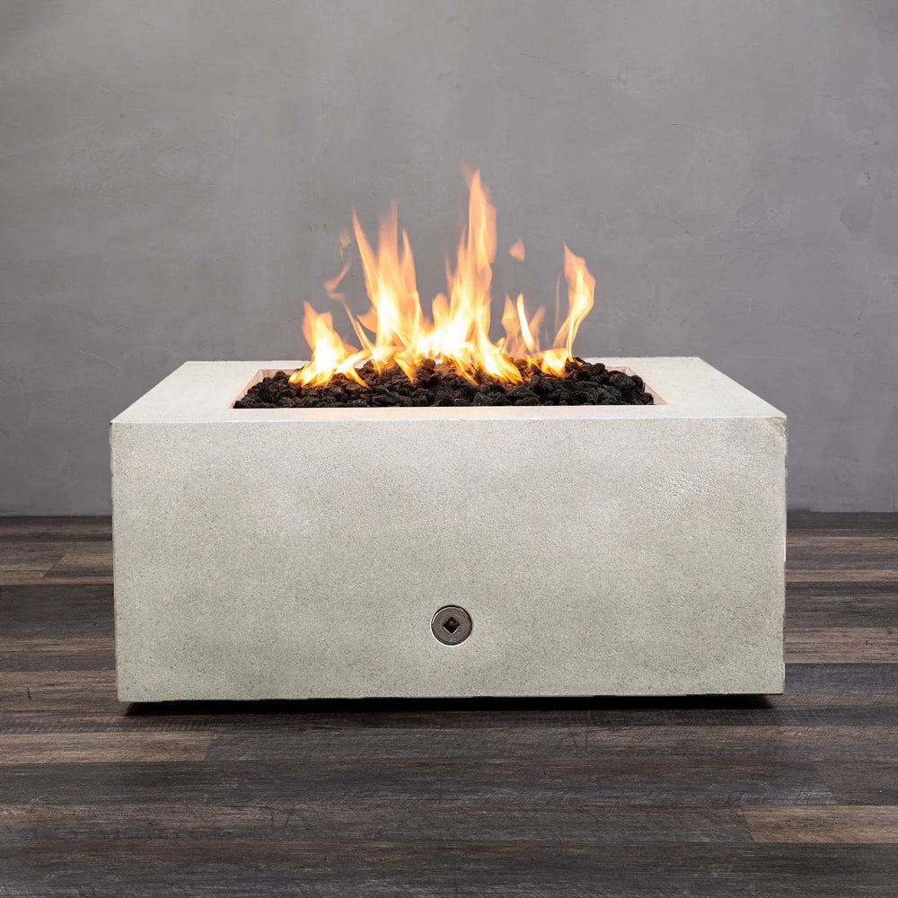 Starfire Designs Rustic Gravity 36-inch Square Concrete Gas Fire Pit in White with vibrant flames, ideal for outdoor ambiance