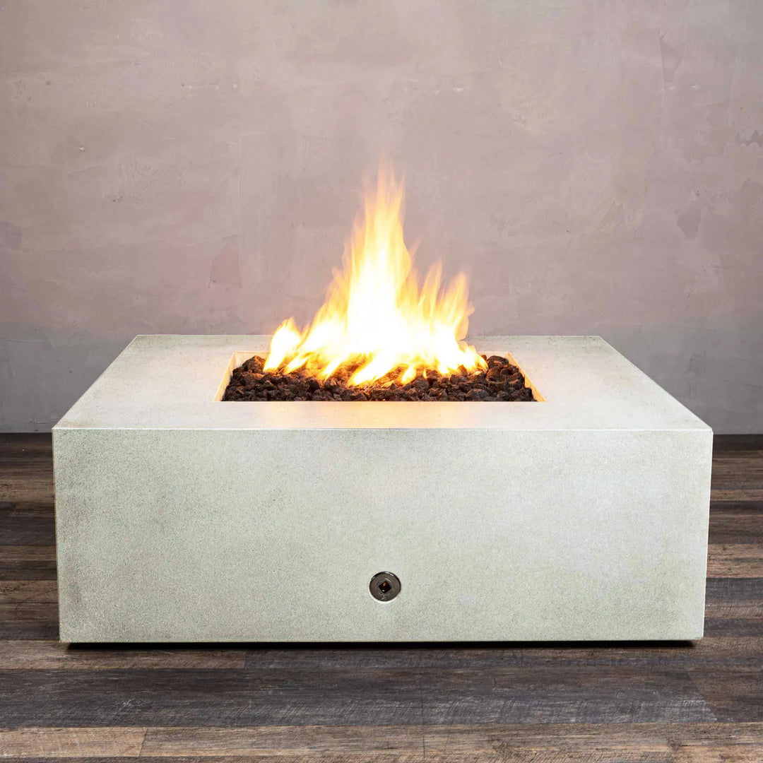 Close-up of the top corner of the Starfire Designs Rustic Gravity 45-inch square concrete gas fire pit in white, showcasing the clean lines and textured concrete finish