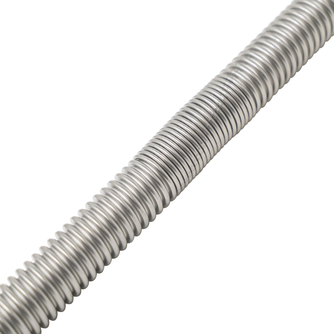 Close-up view of a corrugated stainless steel gas hose, highlighting its flexibility and durability, ideal for secure gas connections in outdoor fire pits and grills