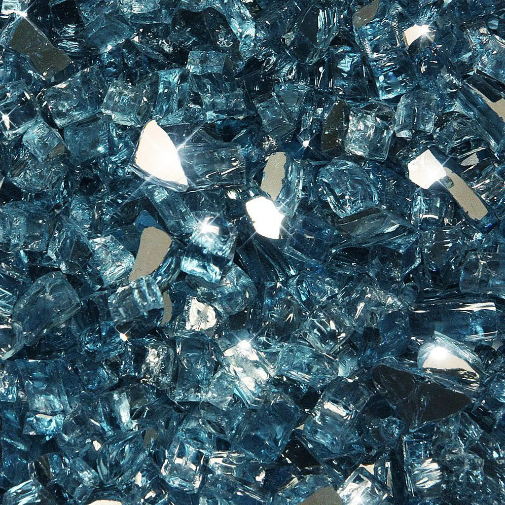 A close-up image of Starfire Glass 1/4" Broken Fire Glass in Pacific Blue Reflective. The vibrant blue color with mirrored highlights adds a cool, refreshing look to outdoor fire pits, patio fire tables, or backyard fire features. Long-lasting and heat-resistant.