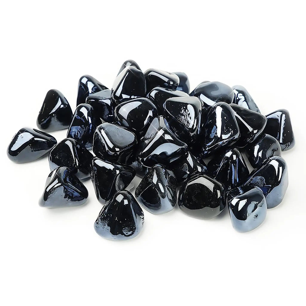 A collection of Starfire Glass Reflective Fire Diamonds in Black, designed for fire pits and fireplaces. These heat-resistant, highly reflective fire glass diamonds create a striking contrast, offering a bold and modern look for gas fire bowls and outdoor fire features.