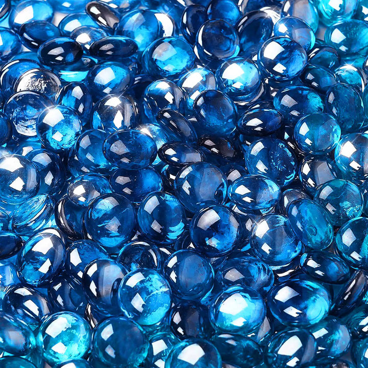 Close-up of Starfire Glass Reflective Fire Drops in Azuria Blue (10lbs), featuring vibrant blue, highly polished, heat-resistant glass drops. Ideal for fire pits, outdoor fire bowls, and modern fire tables, providing a brilliant, reflective glow.