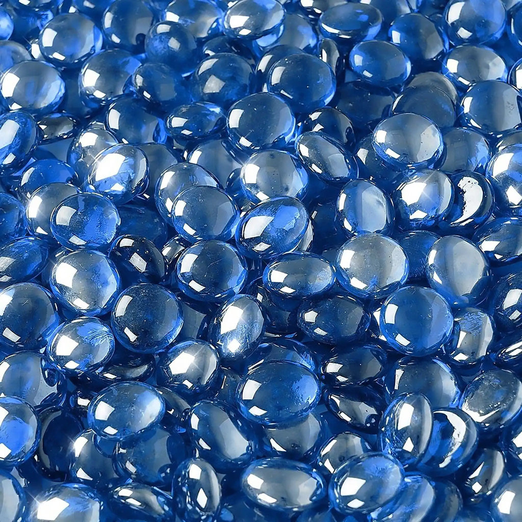 Close-up of Starfire Glass Reflective Fire Drops in Pacific Blue (10lbs), featuring dazzling light blue, smooth, and heat-resistant glass drops. Designed for gas fire pits, patio fire tables, and fireplace inserts.