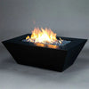 Starfire Designs Steel Mill 60 x 32-inch Rectangle Gas Fire Pit in Black Hammertone finish, with blue fire glass and a brilliant flame display. The fire pit’s wide rectangular surface enhances the ambiance with an impressive fire feature. The black hammertone texture contrasts with the bright flames, making it an ideal centerpiece for luxurious outdoor spaces