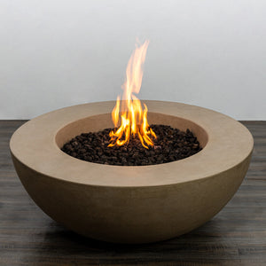 The Starfire Designs Beton 42 Inch Sand Round Concrete Natural Gas Fire Pit with active flames and lava rocks. The bright flames contrast beautifully with the sand-colored concrete, creating a warm ambiance. Ideal for outdoor fire pit gatherings and modern fire table designs.