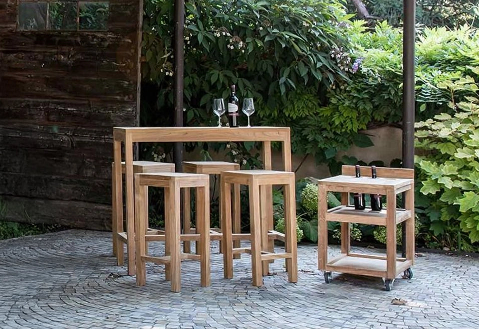 Elegant teak wood outdoor bar set with a tall bar table, matching stools, and a rolling serving cart, ideal for garden entertaining and alfresco dining.