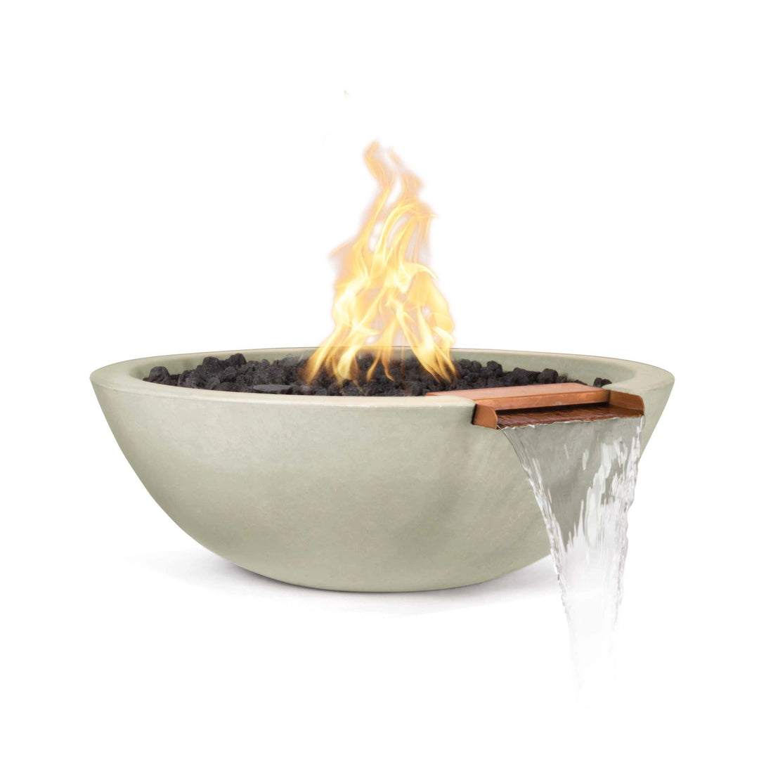 The Outdoor Plus 33" Round Concrete Sedona Fire and Water Bowl in ash finish, showcasing a steady flame and smooth water flow from the copper spillway. This handcrafted fire and water bowl is made from durable concrete, perfect for adding luxury to outdoor spaces. Ideal for fire pit setups and water feature combinations. 