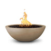 The Outdoor Plus 33" Round Concrete Sedona Fire Bowl in brown finish, blending rustic charm with a dramatic flame and gentle water spill from the copper spout. This handcrafted concrete bowl is perfect for luxurious outdoor fire displays in patios or gardens.