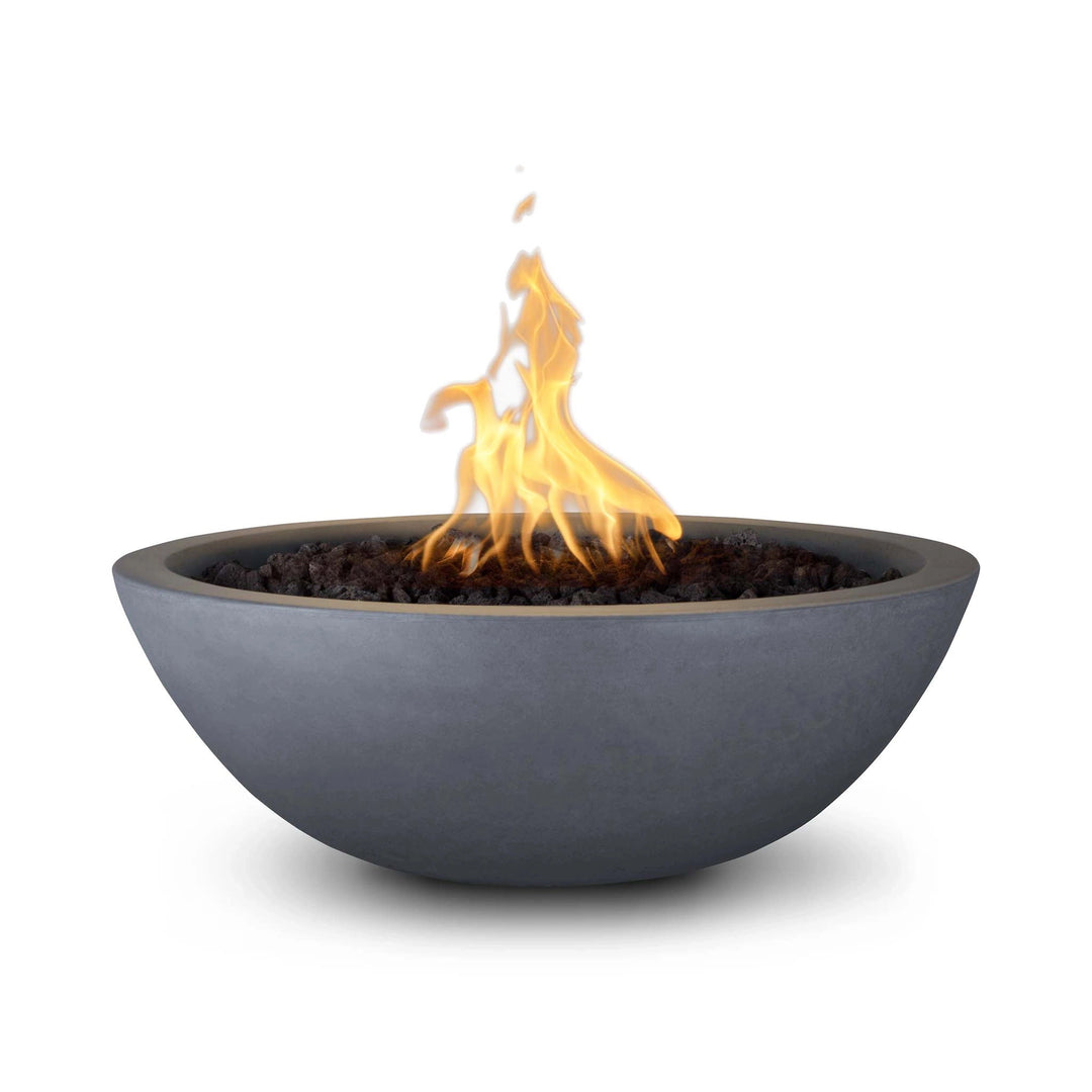 The Outdoor Plus 33" Round Concrete Sedona Fire Bowl in gray finish, featuring a seamless flame and water display from the copper spillway. This durable concrete fire bowl offers both visual appeal and functionality for outdoor spaces, perfect for creating a tranquil yet dramatic ambiance.