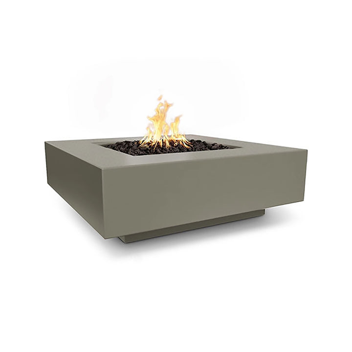 The Outdoor Plus 36-inch Cabo Square Concrete Gas Fire Pit in ash color. A modern square fire pit with a clean design and smooth ash finish, perfect for any outdoor space. Features a sturdy concrete build with a central gas burner surrounded by black lava rocks. Ideal for natural gas or propane setups in modern backyards