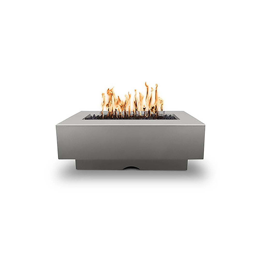 The Outdoor Plus 48" Del Mar Concrete Gas Fire Pit in silver finish, showcasing a sleek and polished surface that exudes a modern, sophisticated style. The minimalist rectangular design and integrated base make it an elegant addition to any outdoor setting. Crafted from high-quality GFRC concrete, it offers durability and aesthetic appeal. 