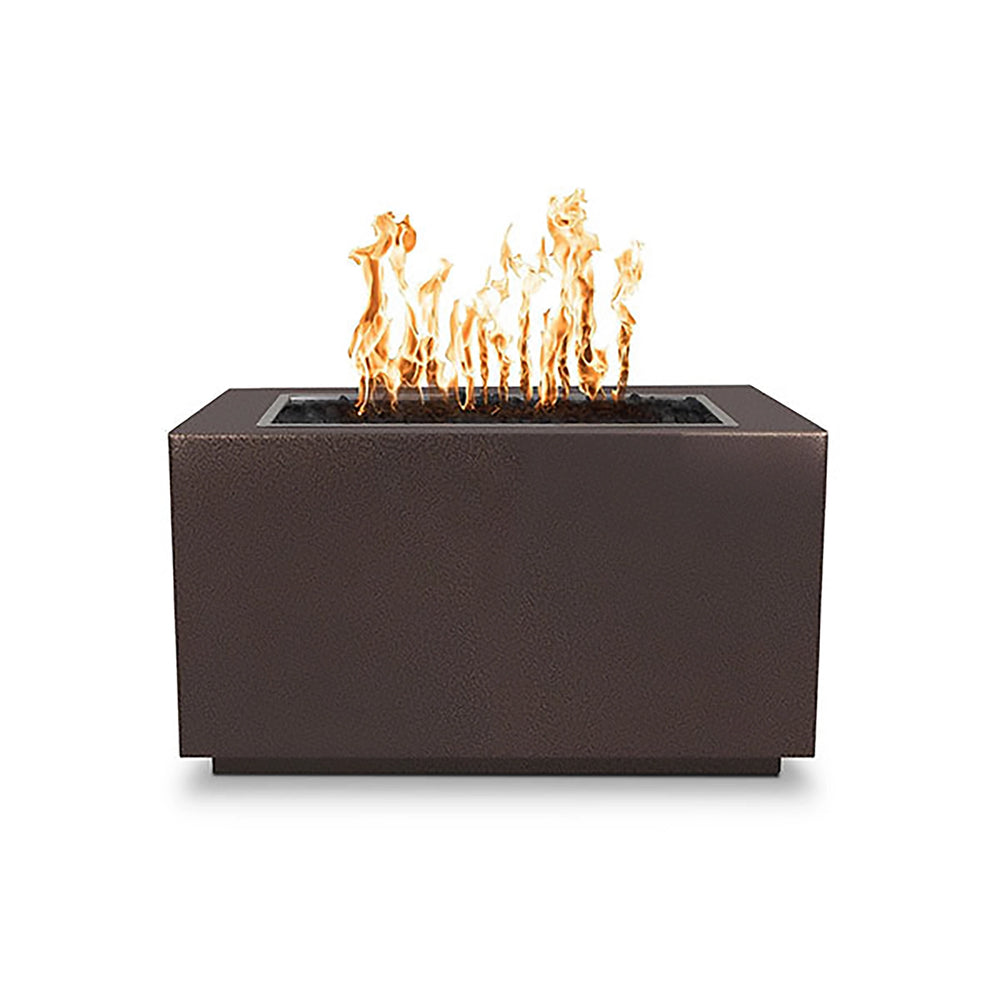 The Outdoor Plus 48-inch Pismo Steel Gas Fire Pit in a copper vein powder-coated steel finish. Featuring a modern rectangular design, this outdoor fire pit adds an elegant touch to any outdoor living area. Its premium powder coating ensures durability and resistance to the elements, while the copper finish creates a warm and inviting focal point. Perfect for backyard gatherings or commercial spaces, this gas fire pit is engineered to provide lasting performance. 