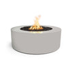 The Outdoor Plus 48-inch Round Unity Fire Pit in a contemporary pewter finish, featuring a subtle metallic sheen that gives an industrial look. The fire pit’s minimalist design paired with the pewter finish provides a versatile piece that fits well in modern and industrial-style outdoor settings. 