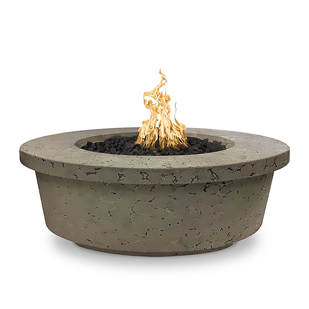 The Outdoor Plus 48" Tempe Concrete Gas Fire Pit in Moss Stone finish features a sturdy round structure with a textured moss-green hue, offering a natural, earthy aesthetic. This elegant fire pit is designed with a wide rim and a central burner surrounded by black lava rocks, making it an ideal centerpiece for outdoor spaces.