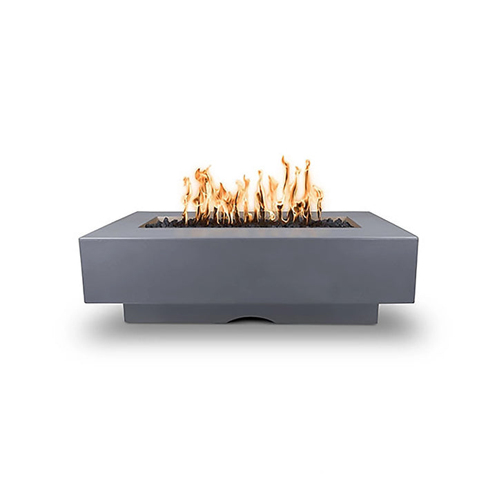 The Outdoor Plus 60-inch Del Mar Concrete Gas Fire Pit in gray color, featuring a modern, minimalist design with natural gas flames. Durable gray concrete finish complements any outdoor decor, providing warmth and style to patio spaces.