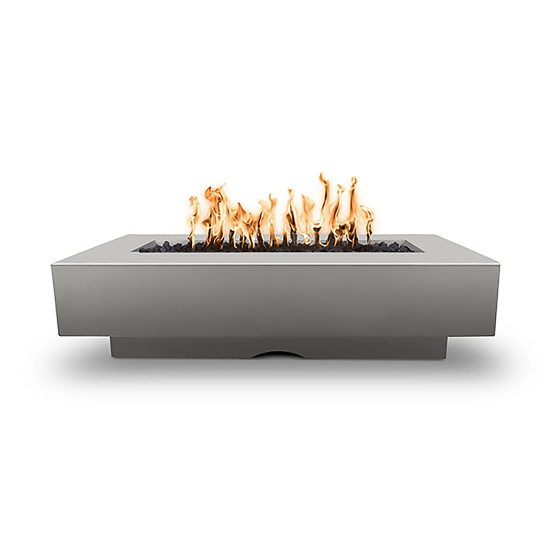 The Outdoor Plus 72-inch Del Mar concrete gas fire pit in natural gray, featuring a smooth finish and modern rectangular design with vivid flames. Perfect for contemporary outdoor settings, offering warmth and style to patios and gardens. Natural gray color pairs well with neutral tones and minimalist decor.