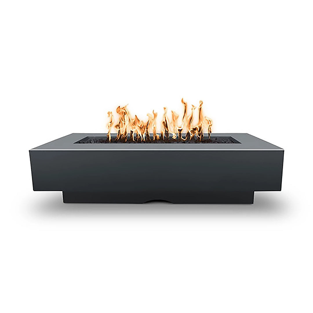 The Outdoor Plus 72-inch Del Mar concrete gas fire pit in slate, characterized by its deep charcoal tone and structured rectangular shape with flickering flames. Ideal for modern and urban outdoor spaces, bringing a bold and stylish element to patios. Slate color enhances contrast in open-air decor.