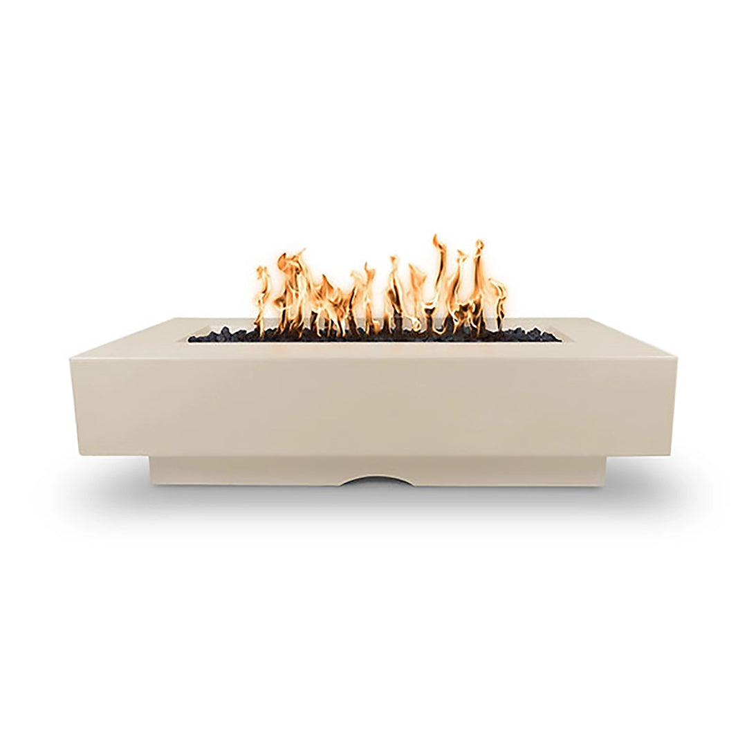 The Outdoor Plus 72-inch Del Mar concrete gas fire pit in vanilla, presenting a soft neutral tone and clean rectangular structure with lively flames. Perfect for blending into warm and cozy outdoor environments, enhancing patios with subtle elegance. Vanilla finish pairs with earthy or pastel-themed settings.