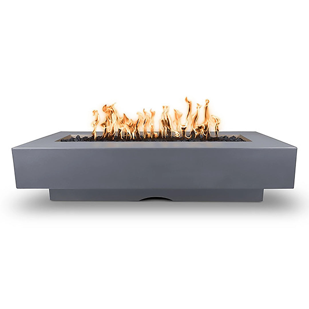 The Outdoor Plus 84” Del Mar concrete gas fire pit in a sleek gray finish. This modern rectangular design offers a stunning flame display, making it a stylish and functional addition to patios or outdoor spaces. Perfect for any contemporary setting.