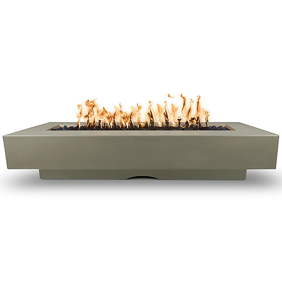 A sleek and contemporary Outdoor Plus 96" Del Mar Concrete Gas Fire Pit in Ash color. The rectangular design features clean lines, a flat top surface, and a wide flame trough filled with lava rocks, making it a sophisticated centerpiece for any outdoor patio or garden.