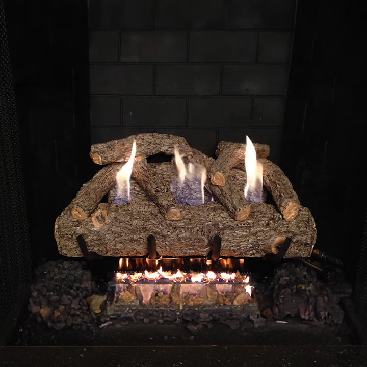 A close-up view of the Vented Designer Plus Gas Logs Golden Oak by Real Fyre, featuring a natural gas flame with well-positioned oak logs. This setup creates a strikingly real wood-burning appearance, complete with glowing embers. Ideal for enhancing the warmth and comfort of any fireplace.