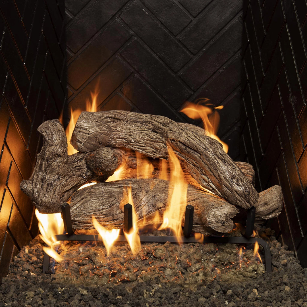 Real Fyre Coastal Driftwood vented gas logs in 18-inch size, with realistic flames and embers, creating a warm, natural ambiance ideal for traditional fireplaces, showcasing high-quality driftwood detailing.