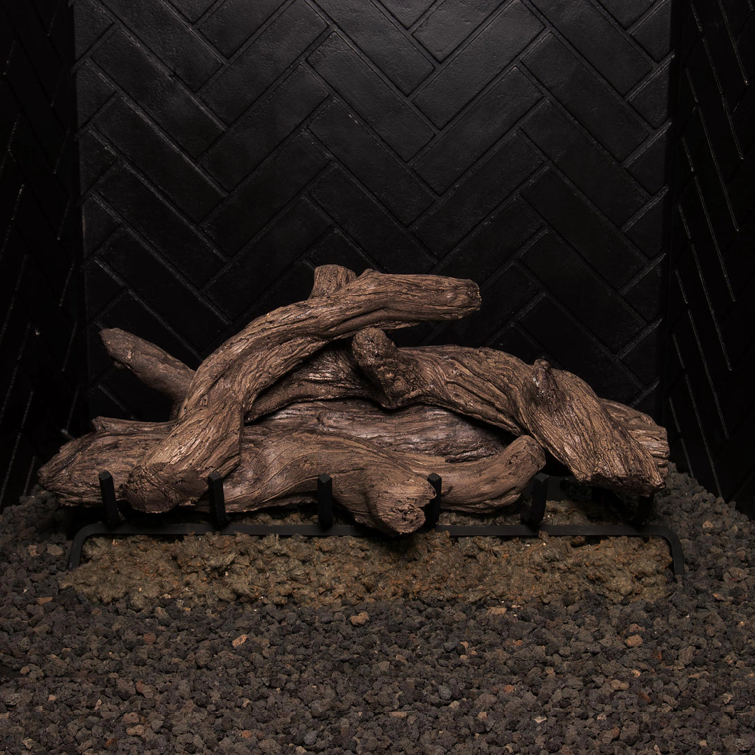 Vented gas logs by Real Fyre in Coastal Driftwood style, 30-inch set with no flames, arranged to showcase authentic driftwood patterns, offering a rustic look suitable for various fireplace designs.