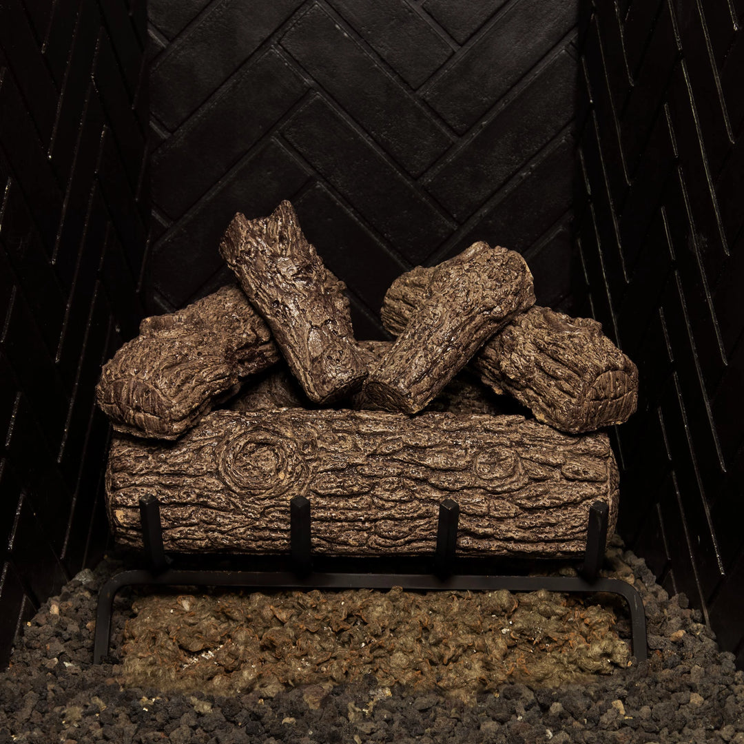 Unlit Real Fyre 18-inch Golden Oak vented gas logs, highlighting the detailed oak log textures. Designed for vented fireplaces, these ceramic logs provide an authentic, natural oak appearance, enhancing the overall look of your fireplace, even when the fire is not burning.