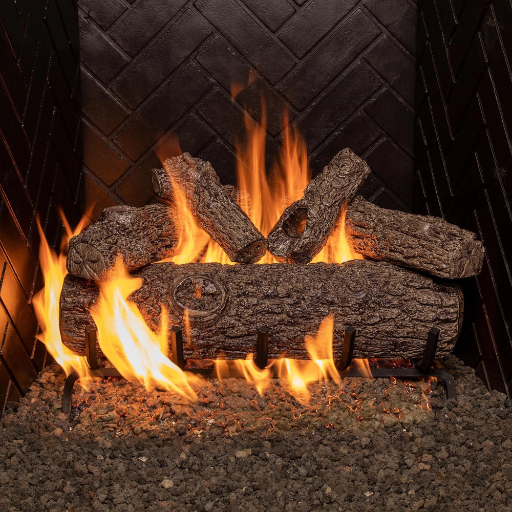 Golden Oak vented gas logs by Real Fyre, 24 inches in size, showcased with the fire lit. The detailed oak log texture and realistic flame effect create an authentic fireplace experience. Perfect for adding both warmth and natural beauty to vented indoor gas fireplaces.