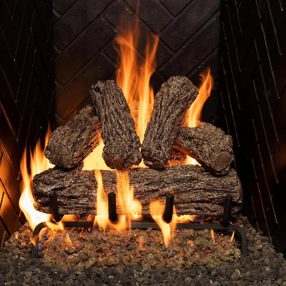 Real Fyre 16-inch Rustic Oak vented gas logs glowing with realistic flames, showcasing natural textures and warmth for an authentic fireplace ambiance