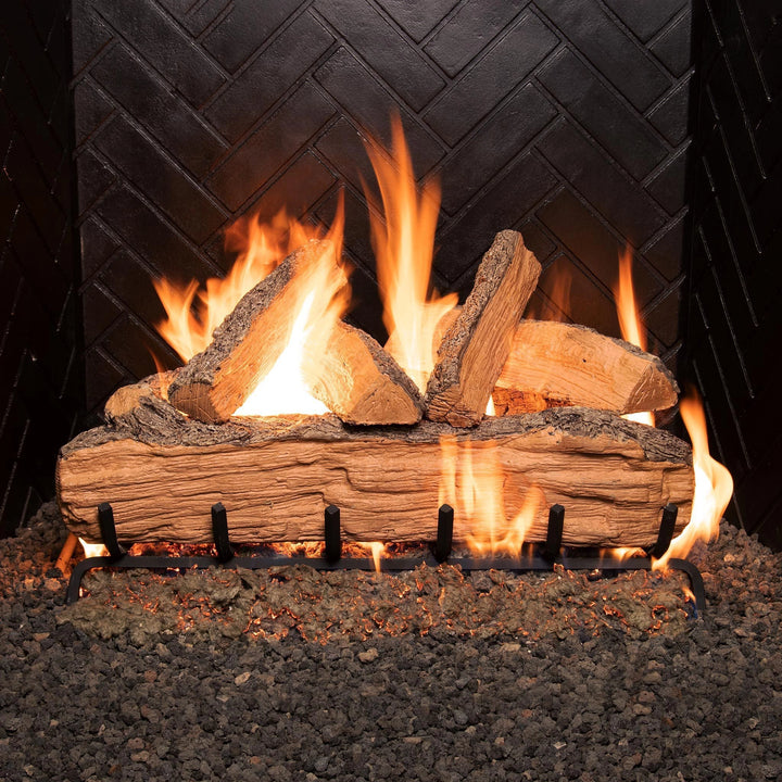 Vented Gas Logs Split Oak by Real Fyre 30-inch fire lit set showcasing realistic oak wood design with vibrant flames. Perfect for indoor gas fireplaces, offering both visual appeal and warmth. Ideal for enhancing the look of traditional wood-burning fireplaces without the mess. Key features include vented design, oak log aesthetics, and natural-looking flames.