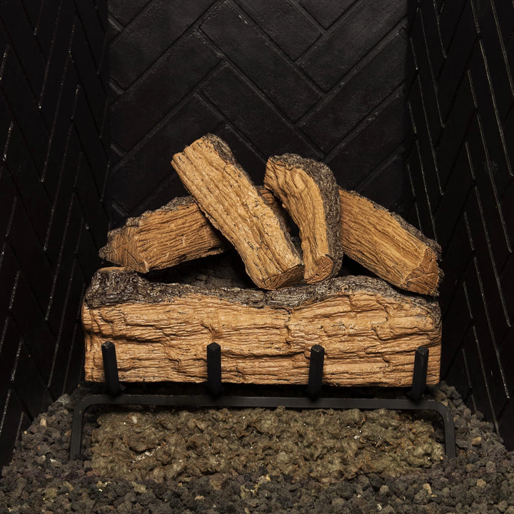 Vented Gas Logs Split Oak by Real Fyre, unlit in a 18-inch size. Featuring a highly realistic split oak design, these logs offer the look and feel of real wood logs for vented gas fireplaces.