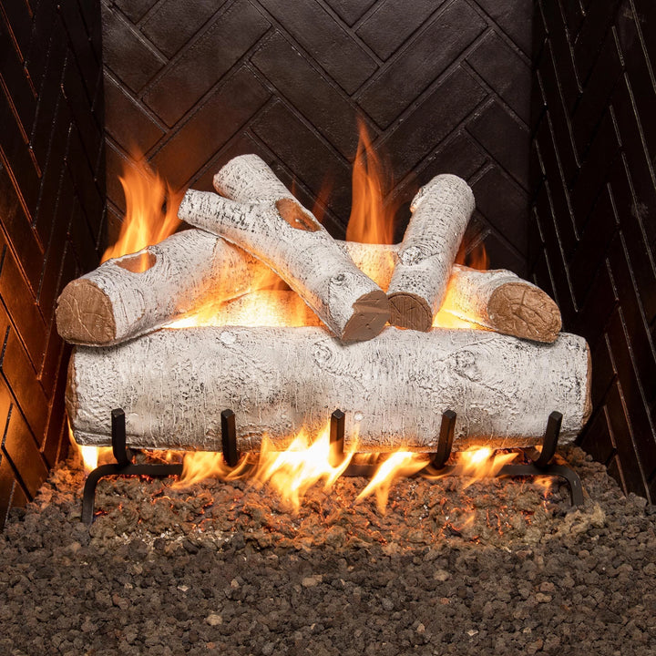 24-inch Real Fyre Vented White Birch Gas Logs in a fireplace, glowing with realistic flames, showcasing an elegant birch woodgrain design for cozy ambiance.